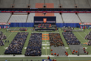 The Class of 2015 gathered in the Carrier Dome, where it heard from Chancellor Kent Syverud, commencement speaker Mary Karr and others.